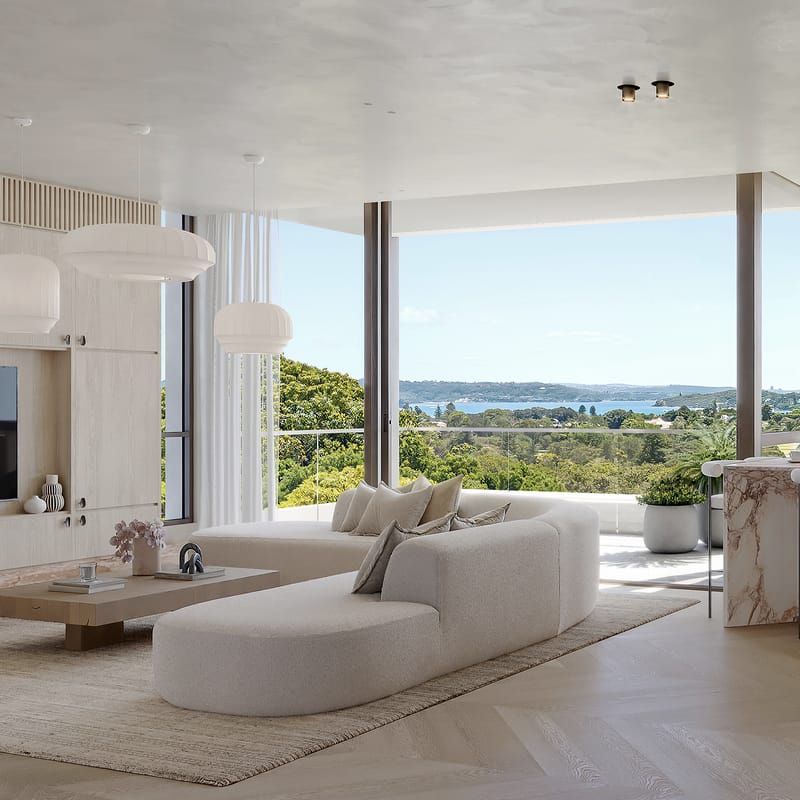 Render of an apartment living room with a curved sofa, marble island bench and floor-to-ceiling glass looking over bushland to the harbour